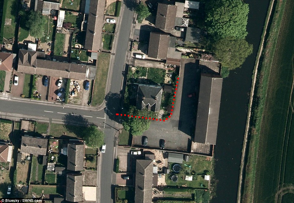 An aerial shot of Mrs Collins house, marked up to show exactly where the fence erected around the house has been built 