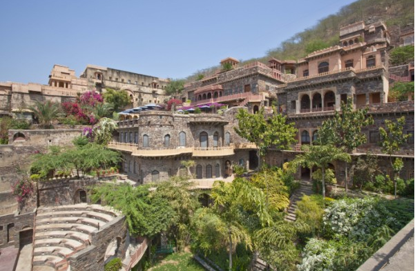 This hotel (formerly a palace and fort) was built in the 1400s high in Rajasthan's hills. It was renovated to become a luxury hotel with 12 stories and 7 wings, as well as hanging gardens, two pools, a spa, and a zip line. Visitors are encouraged to explore the building's hidden alleys and corners, but getting here requires a hike up to the fort.