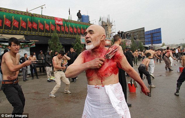 This man flagellates himself during the festival in Kabul, Afghanistan to commemorate Imam Hussein's death