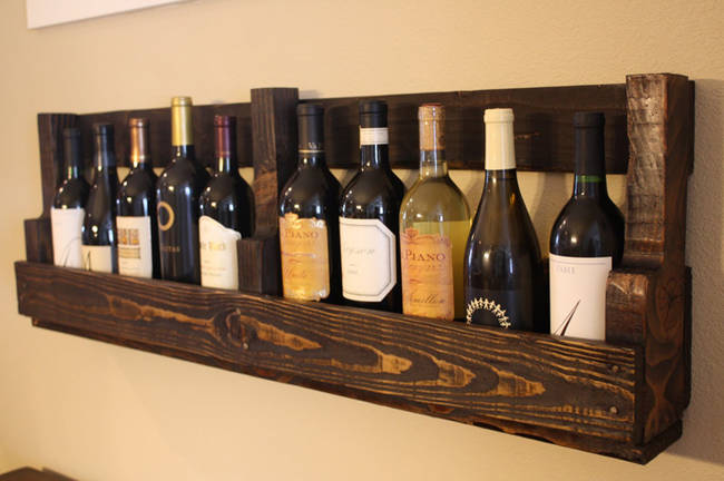 8.) Break a wood pallet down and use it to store wines in your kitchen.