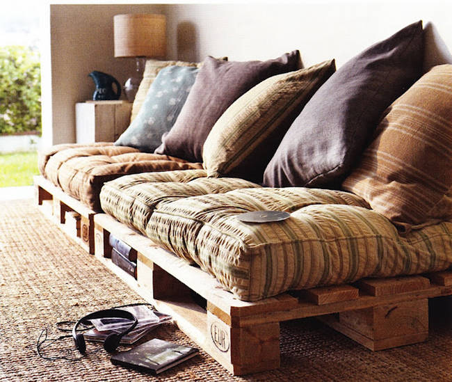 6.) Who needs a pricey futon when you can use some pallets and cushions to make a comfy couch?