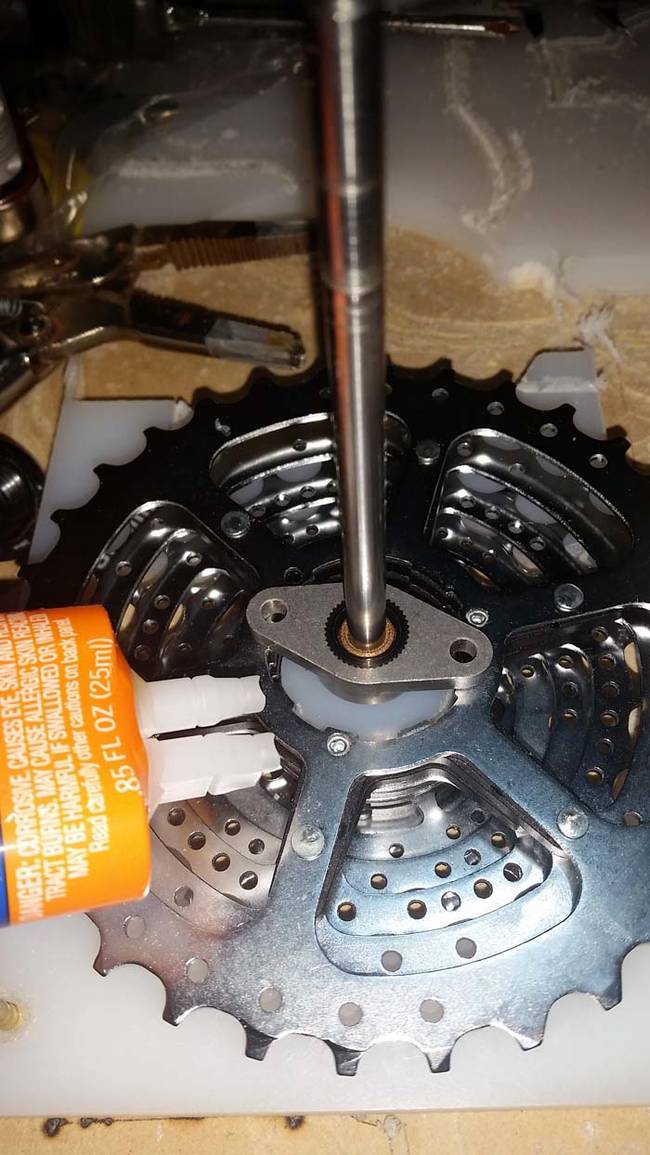 Before attaching the cassette to the motor, he used a bearing bar to center the shaft.