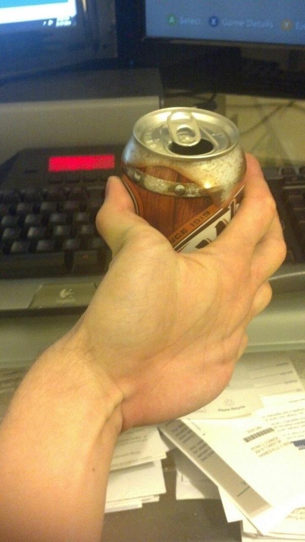 This lovely, refreshing can of root beer being drunk in a completely normal way.