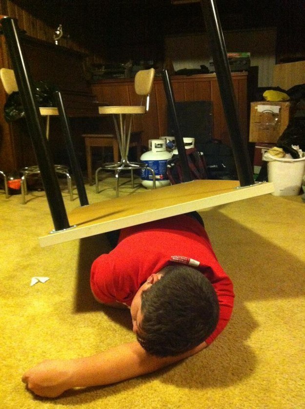 Using a table as a blanket.