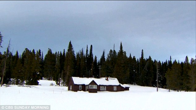 Winter home: This small 100-year-old cabin is where Fuller calls home. he packs it with just enough food to last the winter 