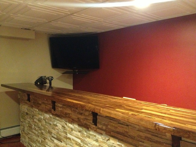 And what's a basement bar without a mounted TV?