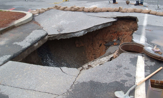 People who live above sinkholes can live oblivious to their existence for quite some time before the earth claims their home.