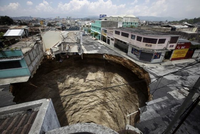 Humans can cause sinkholes through drilling, mining and even constructing buildings. If it changes the way water drains, it could potentially make a hole.