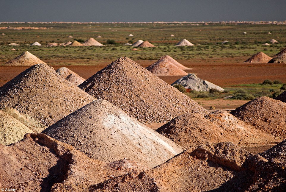 Giant mole hills? An entire population of over a thousand residents live underground in dugouts at Coober Pedy in northern South Australia