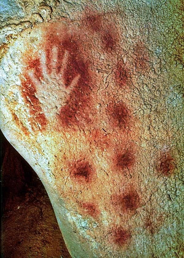 A 27.000 year-old hand print, from rocks on an Indonesian island.