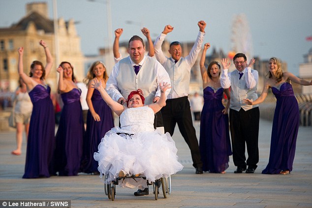 The 31-year-old was born with brittle bone disease, and doctors warned her parents she would never sit-up or walk unaided. She and husband Norman are pictured on their wedding day in Weston-super-Mare