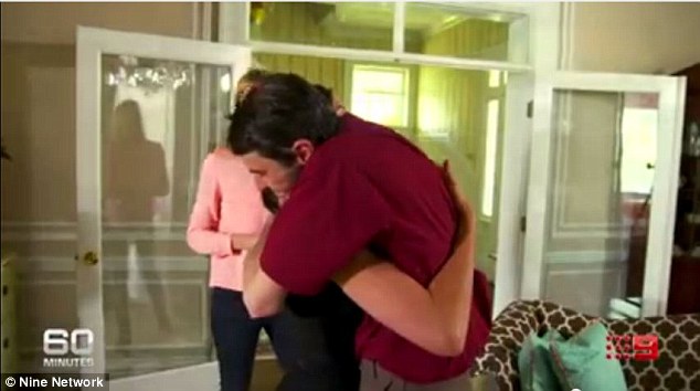 Emotional: Richard Norris and Rebekah Aversano embrace, the reunion proving overwhelming