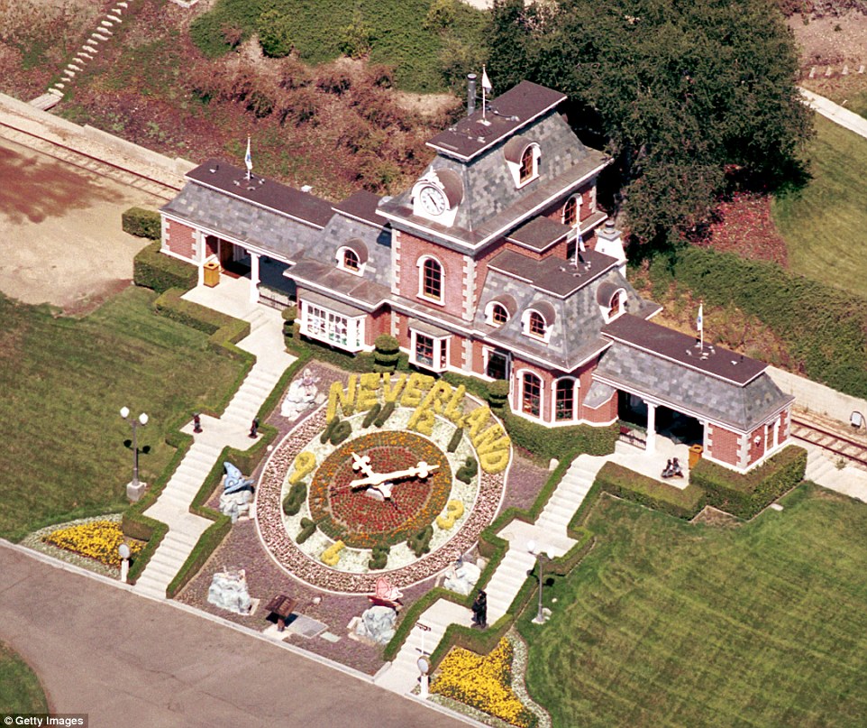 Everlasting: There are still a few small signs that the property (pictured in 2001) was the Neverland Ranch, with its train and clock made from flowers that spells out 'Neverland' retained and restored