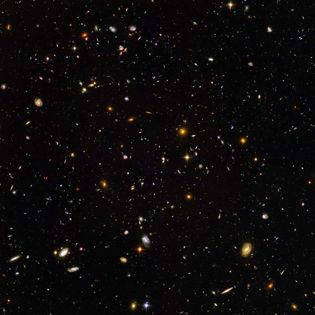 The Hubble Ultra-Deep Field photograph. Every point of light you see here is a galaxy as massive and diverse as our own Milky Way.