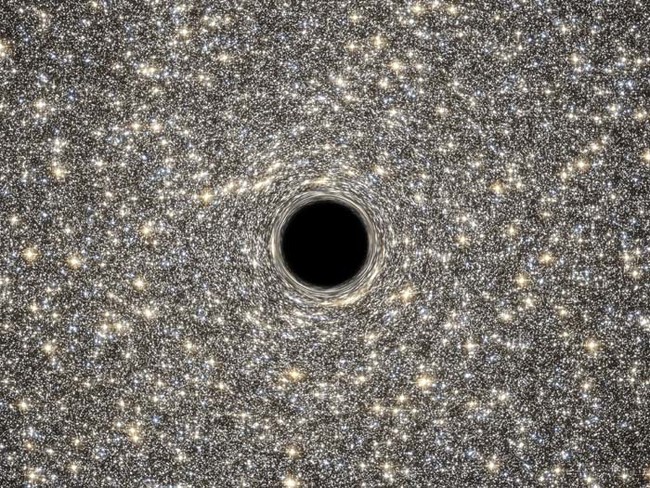 This massive black hole is located in the center of one of the smallest galaxies ever discovered.