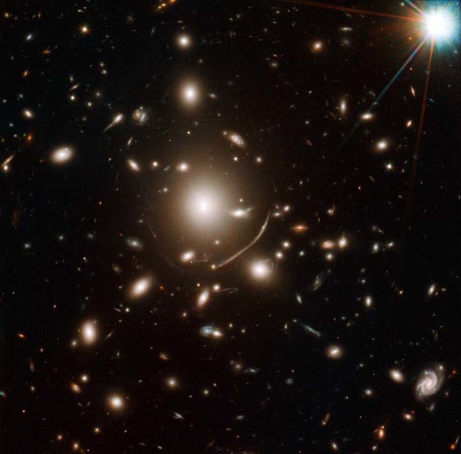 You're viewing one of the oldest galaxies in the universe. Its stars formed about 200 million years after the Big Bang.