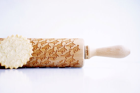 A laser-engraved rolling pin that stamps cats onto your cookies.