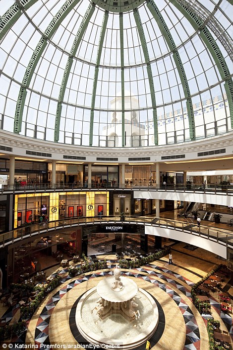 A domed ceiling illuminates the Mall of the Emirates in Dubai