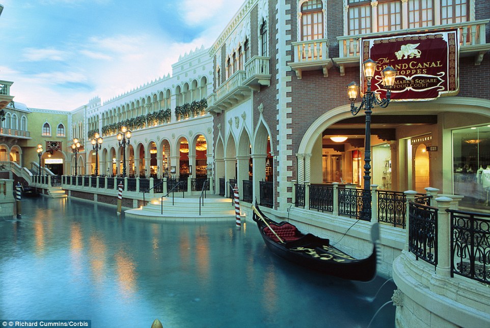 Guests can take a gondola ride to their store of choice at The Grand Canal Shoppes at The Venetian Hotel in Las Vegas, USA