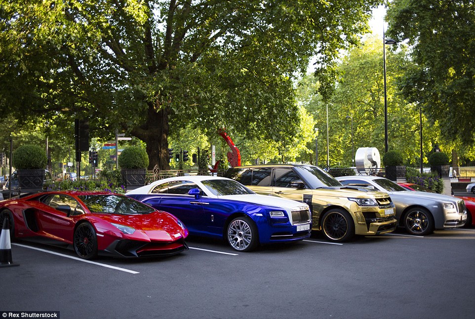 An eye-watering line-up of lavish supercars park up out the Dorchester Hotel following the arrival of Middle Eastern playboys to the capital