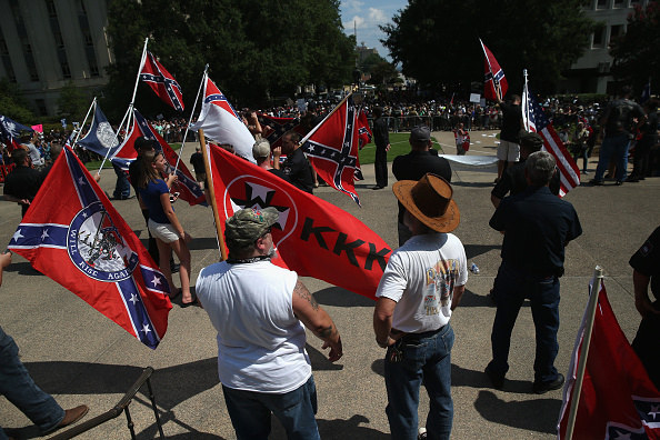 Saturday, members of the North Carolina's Loyal Knights of the Ku Klux Klan gathered in front of the South Carolina State house in Columbia to protest the recent decision to remove the Confederate flag from the grounds.