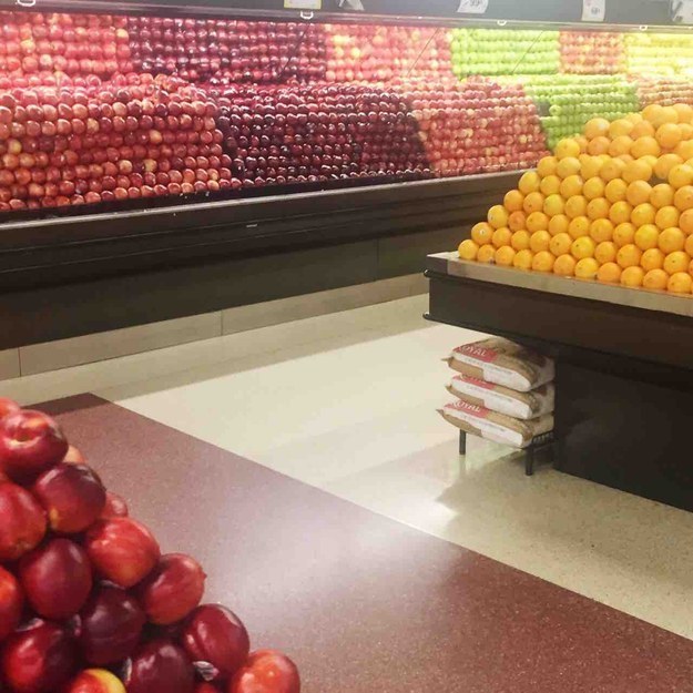 This beautiful display of apples and oranges.