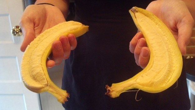 A banana, perfectly split in half...lengthways.