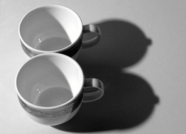 A voluptuous couple of tea cups.