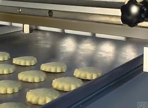 Cookie shaping machine.