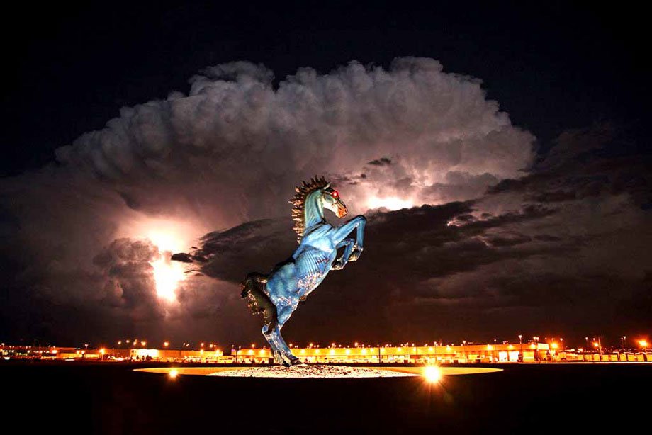 You are greeted at the airport by Mustang, by New Mexico artist Luis Jiménez, was one of the earliest public art commissions for Denver International Airport in 1993. Standing at 32 feet tall and weighing 9,000 pounds "Mustang" is a blue cast-fiberglass sculpture with red shining eyes. Jiménez died in 2006 while creating the sculpture when the head of it fell on him and severed an artery in his leg.