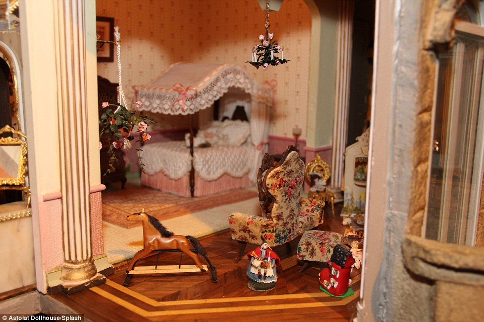 The hand-made 'Astolat Dollhouse Castle' was built over a 13-year period by Colorado-based miniature artist Elaine Diehl 