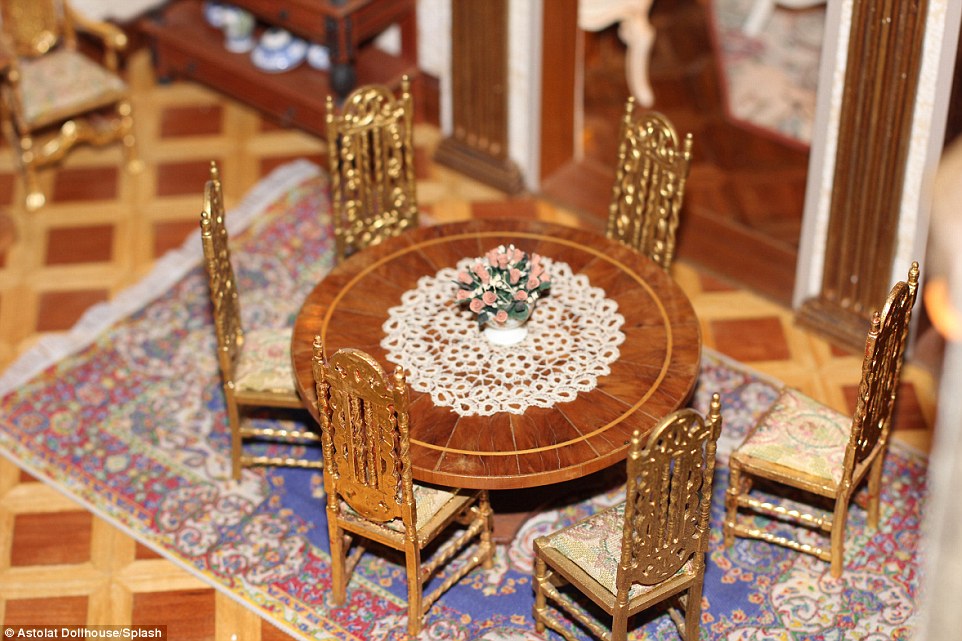 Carpenters, goldsmiths, glass blowers, and silversmiths made incredible miniatures such as these gold leaf chairs