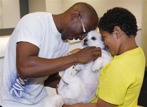 This Denver man and his son, who found their long-lost dog after years of being separated.