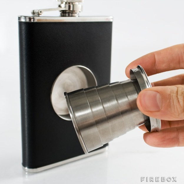 A flask featuring a pop-out shot glass.