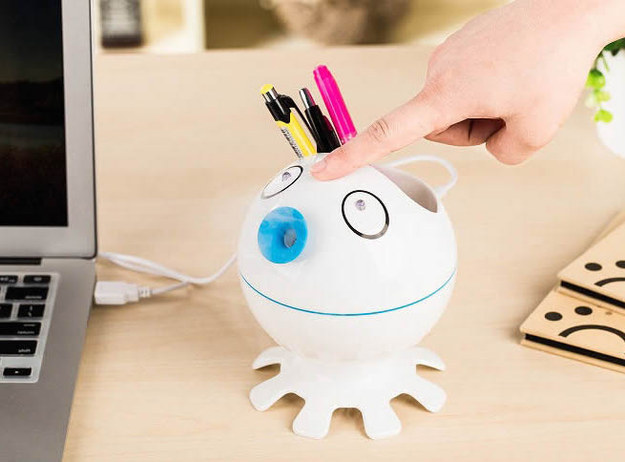 A pen holder that's trying to be hush hush about the fact that you can use it as a humidifier.
