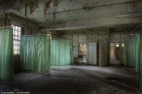 No matter how many times he has been threatened or arrested, Dan thinks it's all worth it. These haunting photos from an abandoned asylum prove his point.