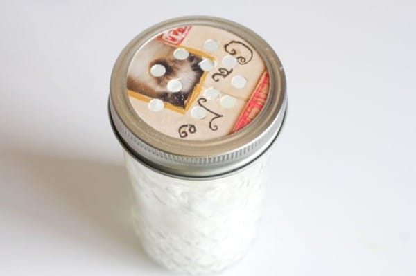 To make a shaker top, she punched holes in a piece of card stock, which she'd cut to fit the jar. 