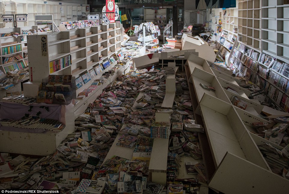 Four years on, a book shop thrown into a state of disarray by the earthquake lies untouched in a chaotic state