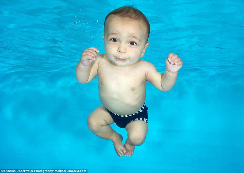 Utilising their natural amphibious reflex, these babies, like eight month old Reuben, held their breath as they were released underwater by professional baby swim instructors