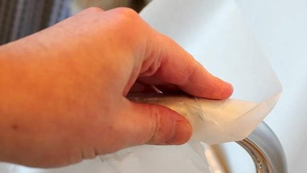 Then, rub a faucet with waxed paper to prevent water spots and finger prints.