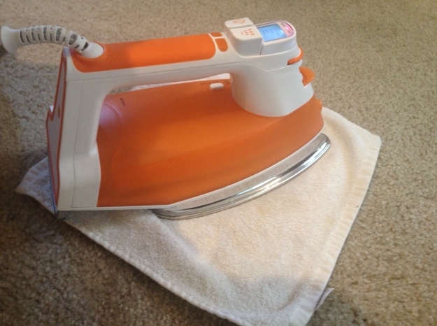Use an iron to remove REALLY stubborn stains from carpet.