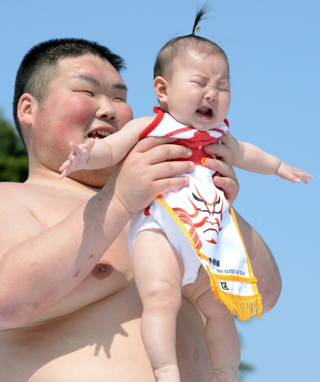 Competitions where sumo wrestlers make babies cry.