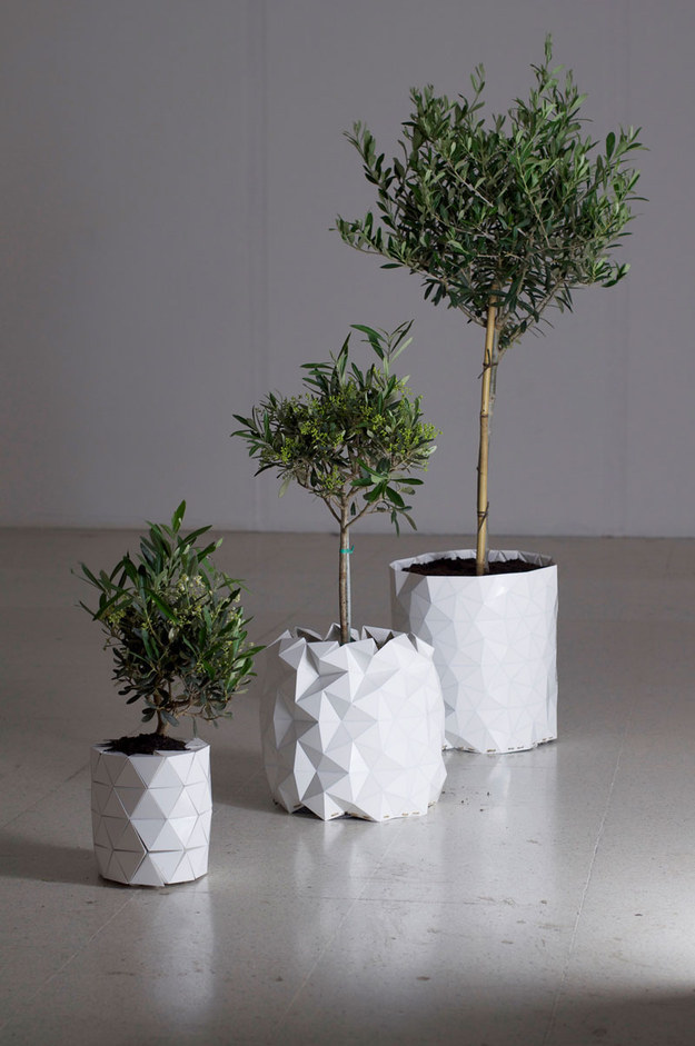 Origami pots that grow along with your plants.