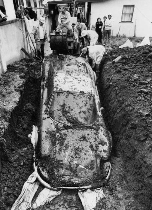 A buried Ferrari Dino was unearthed and restored.