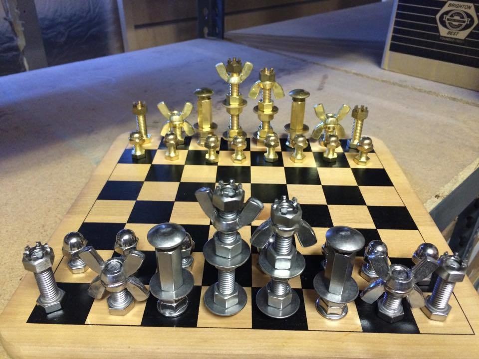 Chess set made from fasteners.