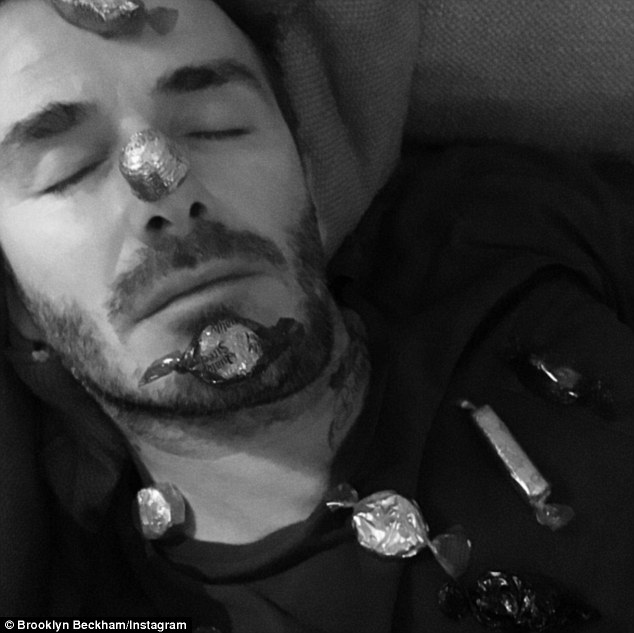 'Got ya!': Brooklyn Beckham got epic revenge on his dad David by sharing some embarrassing photos of him sleeping on his Instagram page on Christmas Day