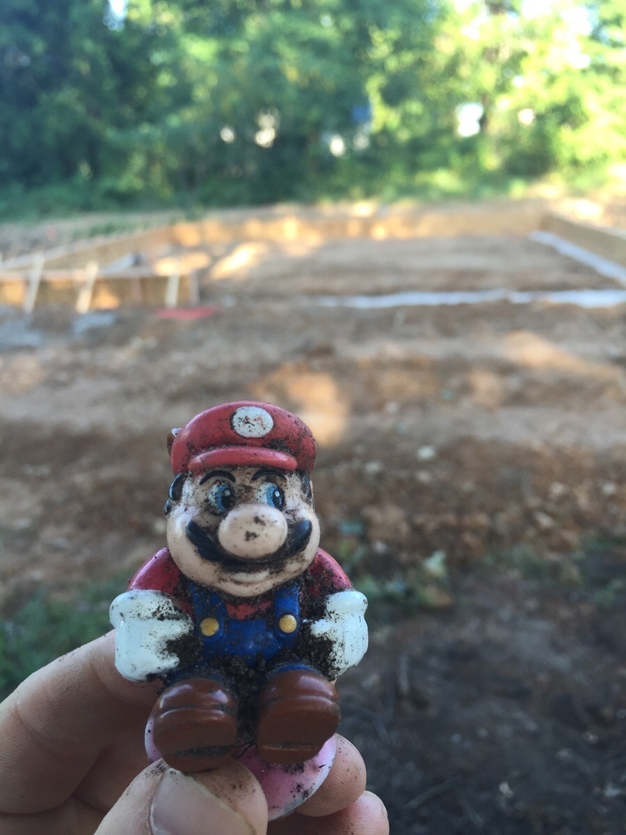 One person found this little Mario figurine inexplicably buried in his backyard -- it's not a big deal, but it's still pretty amusing.