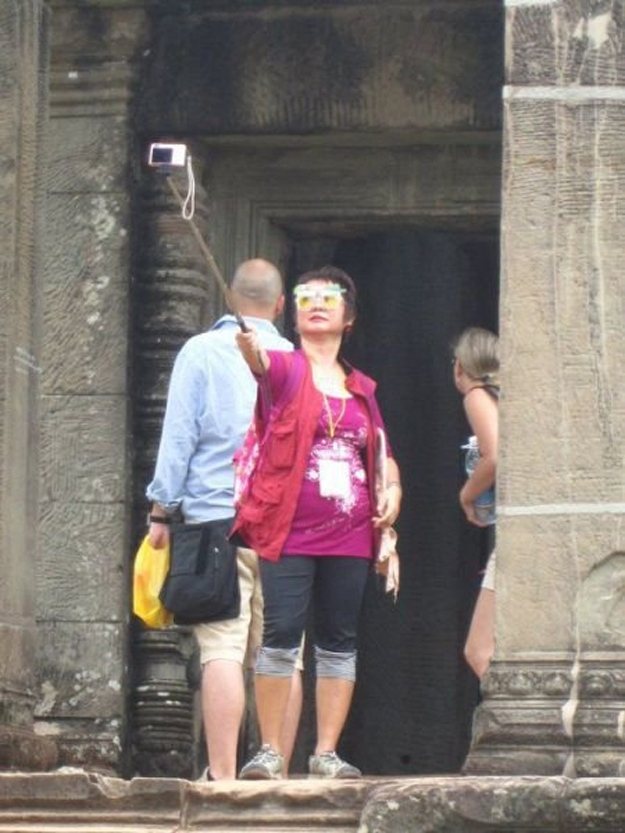 This woman taking a selfie.