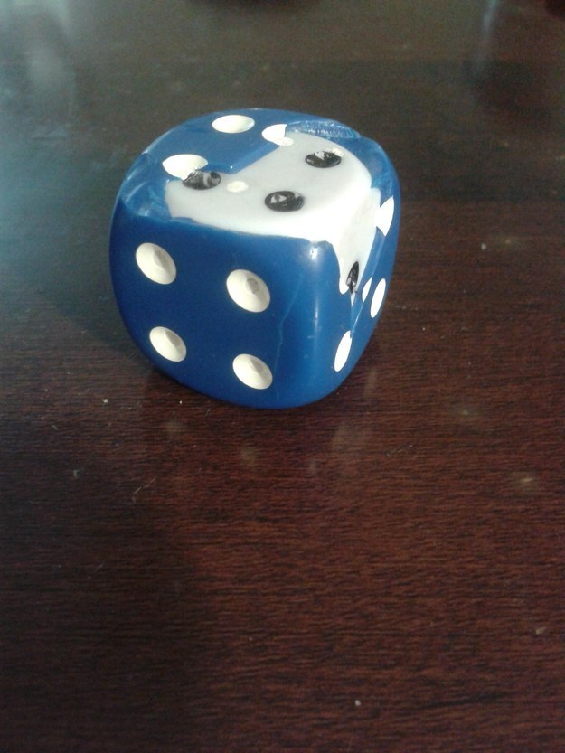 This die that cracked to reveal another die hidden underneath.