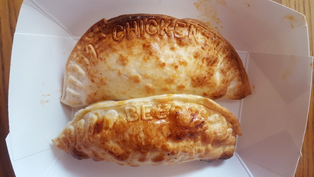 Empanadas that have what they're filled with stamped into the crust.
